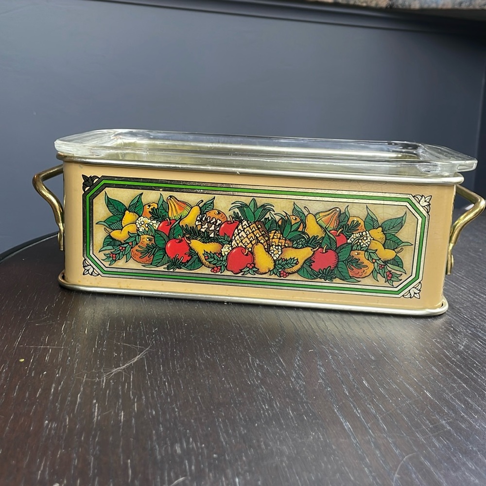 Vintage Pyrex baking dish with TELEFLORA tin